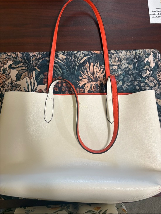 kate spade Handbags - kate spade Cream Tote with Orange Trim and Handles